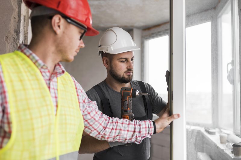 close-up-men-working-together (1)